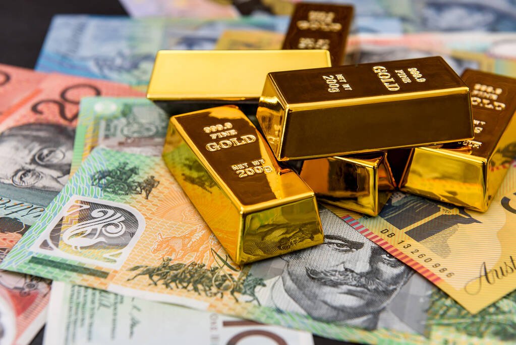 Australian dollars with gold ingots